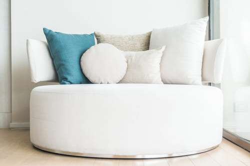 sofa-cojines-azul - Estudio Verona